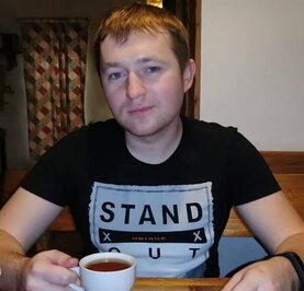 Николай